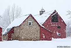 Red barn snowing 74